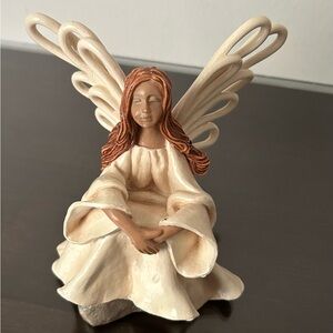 Wings of Tranquility figurine by Smaco Trading Limited.